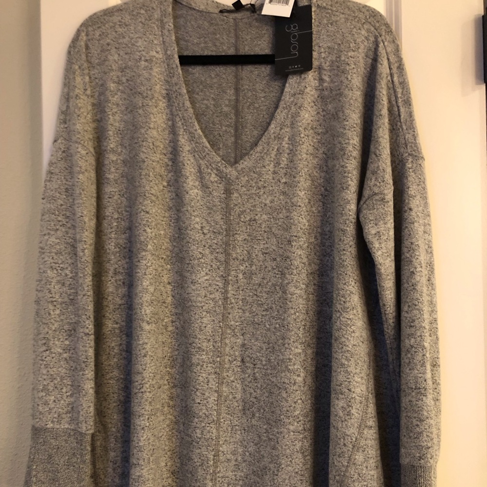 Lightweight tunic length top. NWT